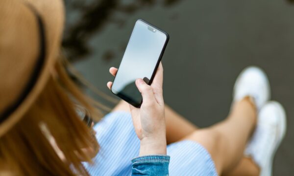 Person Holding Smartphone White Sitting