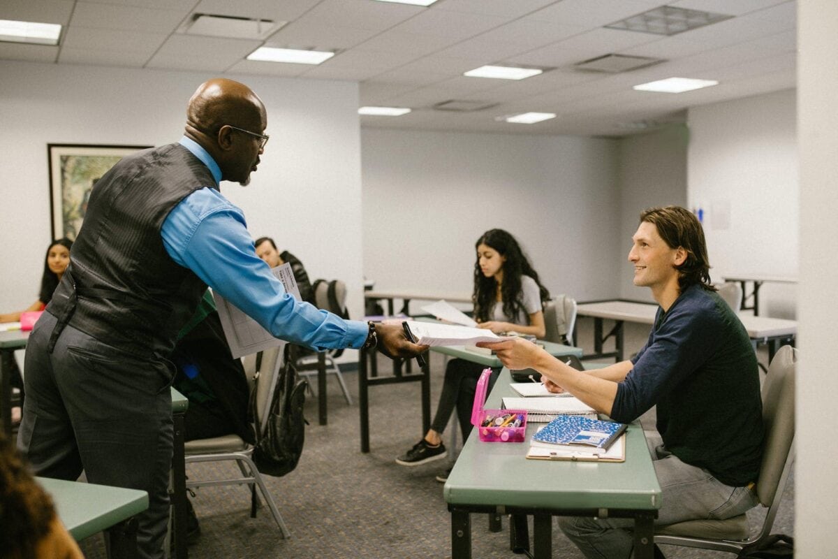 Teacher Giving the Test Result to His Student